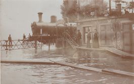 Echtfotokarte Rorschach Hochwasser 1910 mit Dampflok belebt