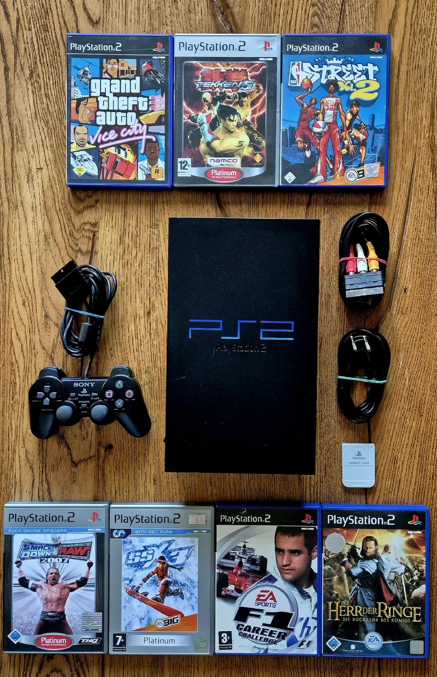Sony Console: Sony PlayStation 2 + Original Sony Controller + 7 Spiele – Usato da Au SG venduto da KonsoleWerk