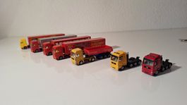 Siku: 7 MAN LKW's, inkl. 2 4-Achser Schlepper