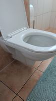 Spühlrandloses Wand-WC Keramik weiss mit Deckel, Marke Laufe
