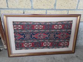 antiker Teppich aufgespannt und gerahmt Bild