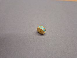Charm Stopper blau / goldfarbig +Garantie