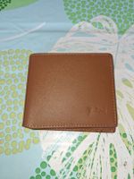 Portefeuille homme en cuir marron bon état général