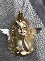 goldener Engel mit Silbernen Flügeln