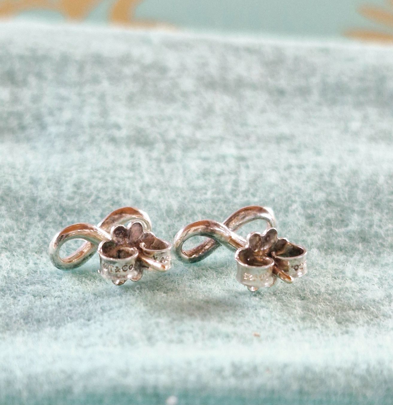 Tiffany & Co. Orecchini pendenti & Orecchini a lobo: Tiffany & Co. Infinity Ohrstecker 925 AG – Usato da Forch venduto da nadinepalermo 1