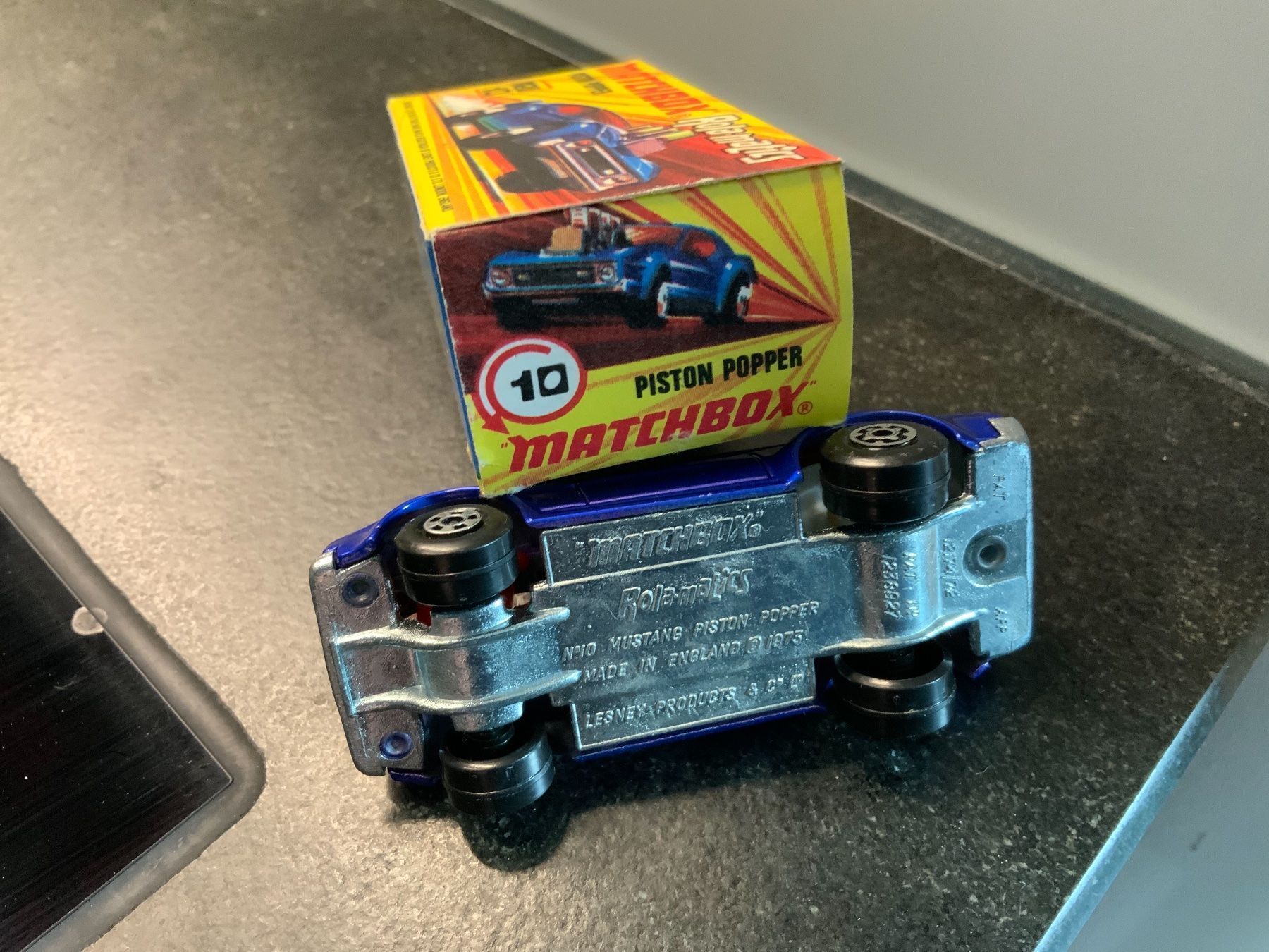Matchbox Modellini d'auto: MATCHBOX Rola-matics Nr.10, PISTON POPPER – Nuovo e nell'imballaggio originale da Erlenbach im Simmental venduto da Model_box 3