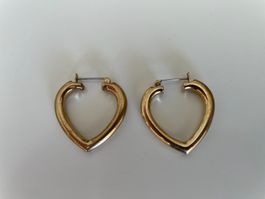 Anciennes jolies boucles d'oreilles dorées en forme de coeur