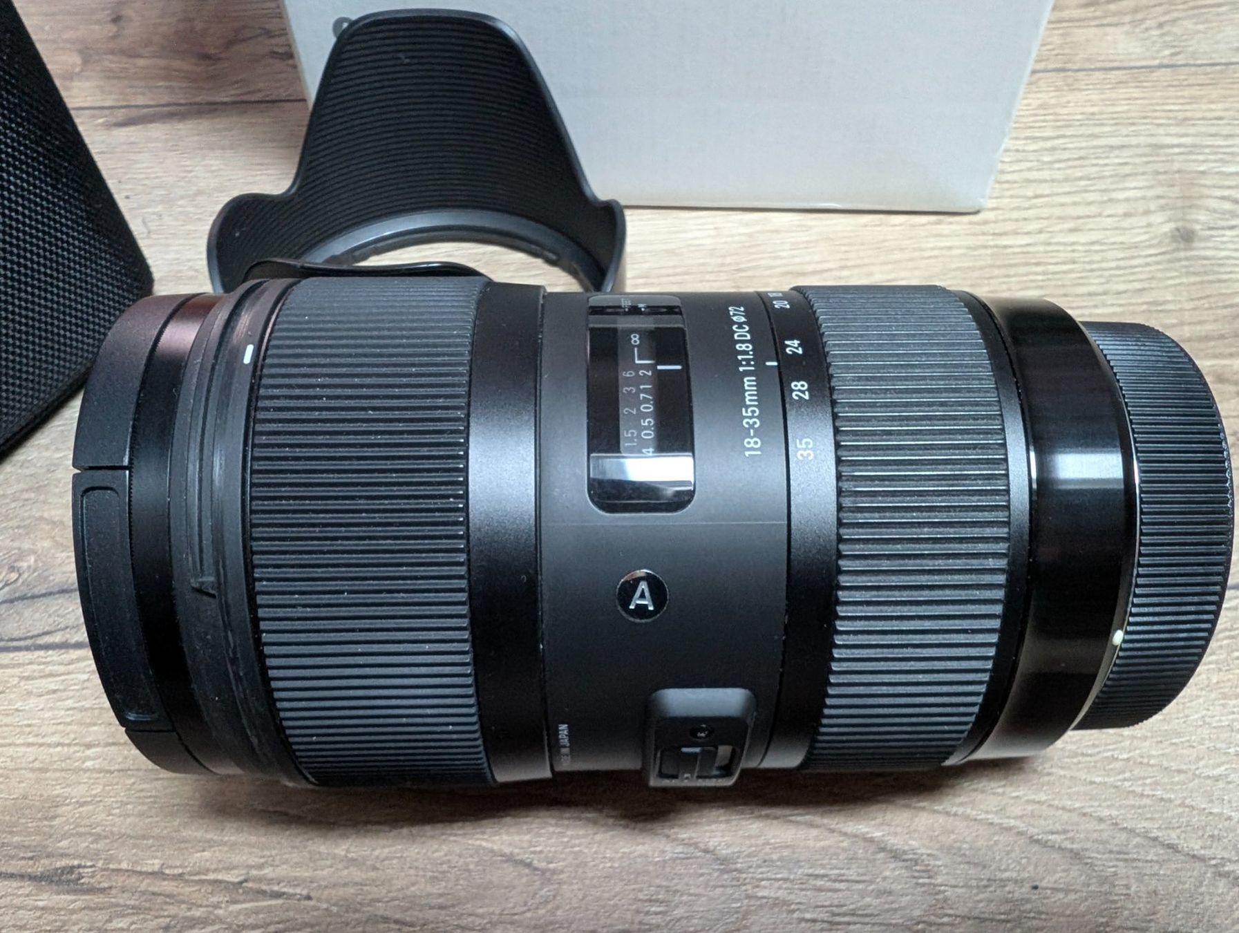 Sigma Obiettivi: Sigma EF 18-35mm F1.8 DC – Usato da Colombier NE venduto da Hanslepire 1