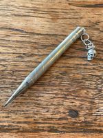 Antiker Dreh-Bleistift aus 800-er Silber mit Totenkopf