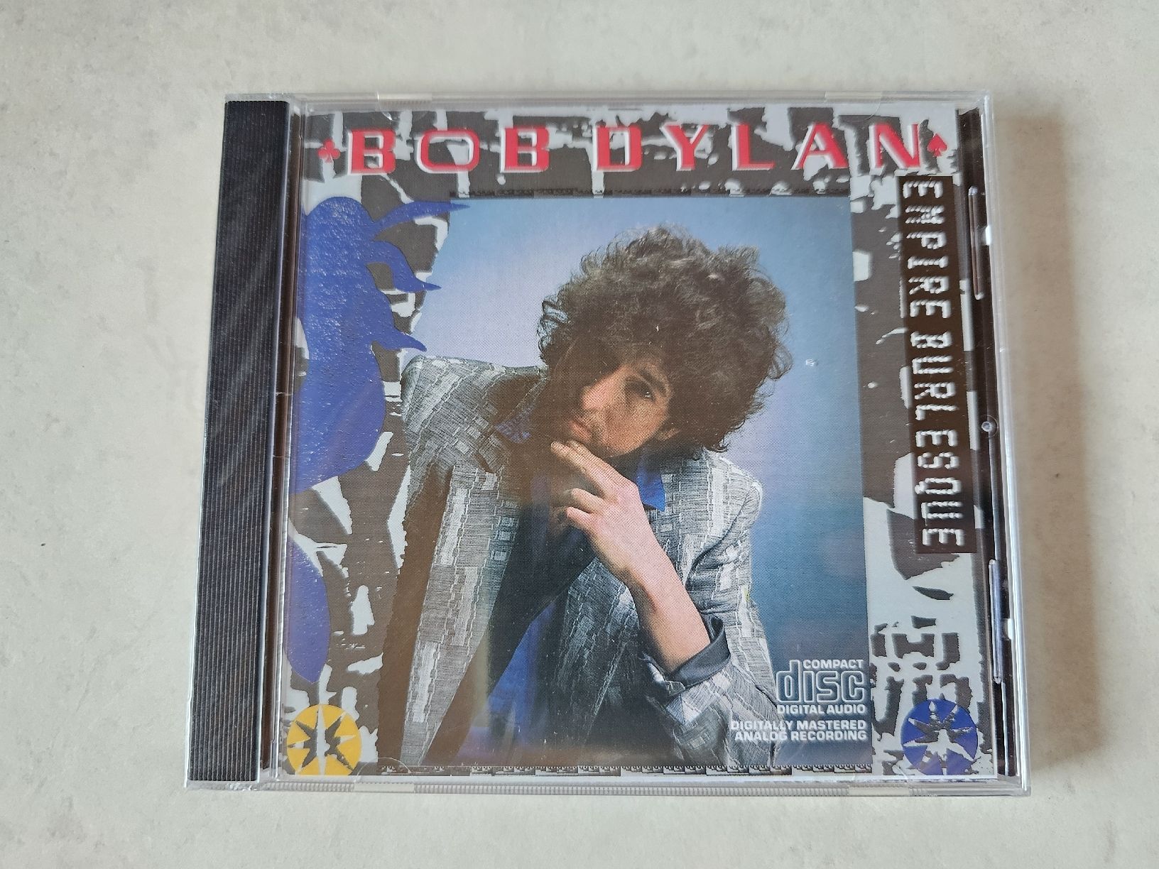 CD: Bob Dylan  -  Empire Burlesque  /  Fabrikneu – Nuovo e nell'imballaggio originale da Schneisingen venduto da backstore24