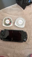 Sony PSP 3004 - 2spiele ein Ladekabel
