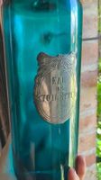 Flacon ancien "Eau de Toilette" en verre bleu turquoise