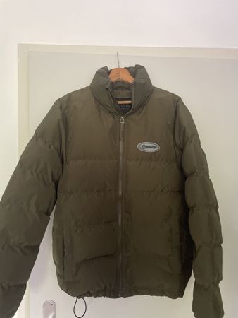 Doudoune Trapstar Vert Olive Taille S, idéale pour l'hiver!