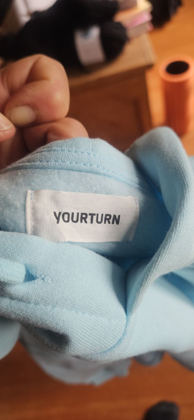 Pullover & Sweatshirts: Light blue hoodie with "Never Again" print, size S – Gebraucht aus Rosshäusern von Heldin01 2