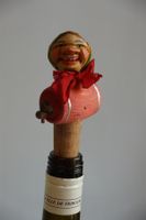 Korkzapfen mit geschnitzter Figur