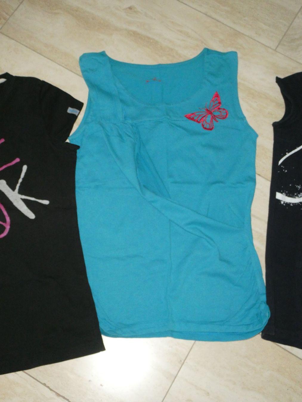Kleiderpakete: 4er Set T-Shirts/Bluse Gr. M – Gebraucht aus Mels von KOSL 3