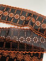 Spitzenborte schwarz neon orange 9cm breit.