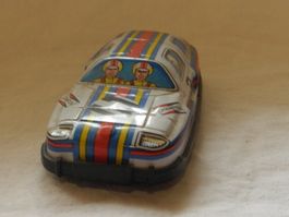 BLECH  TIN TOY RENNWAGEN  MADE IN JAPAN  GUT ERHALTEN