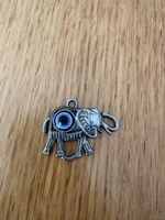 Anhänger Elefant mit blauem Auge silberfarben gebraucht