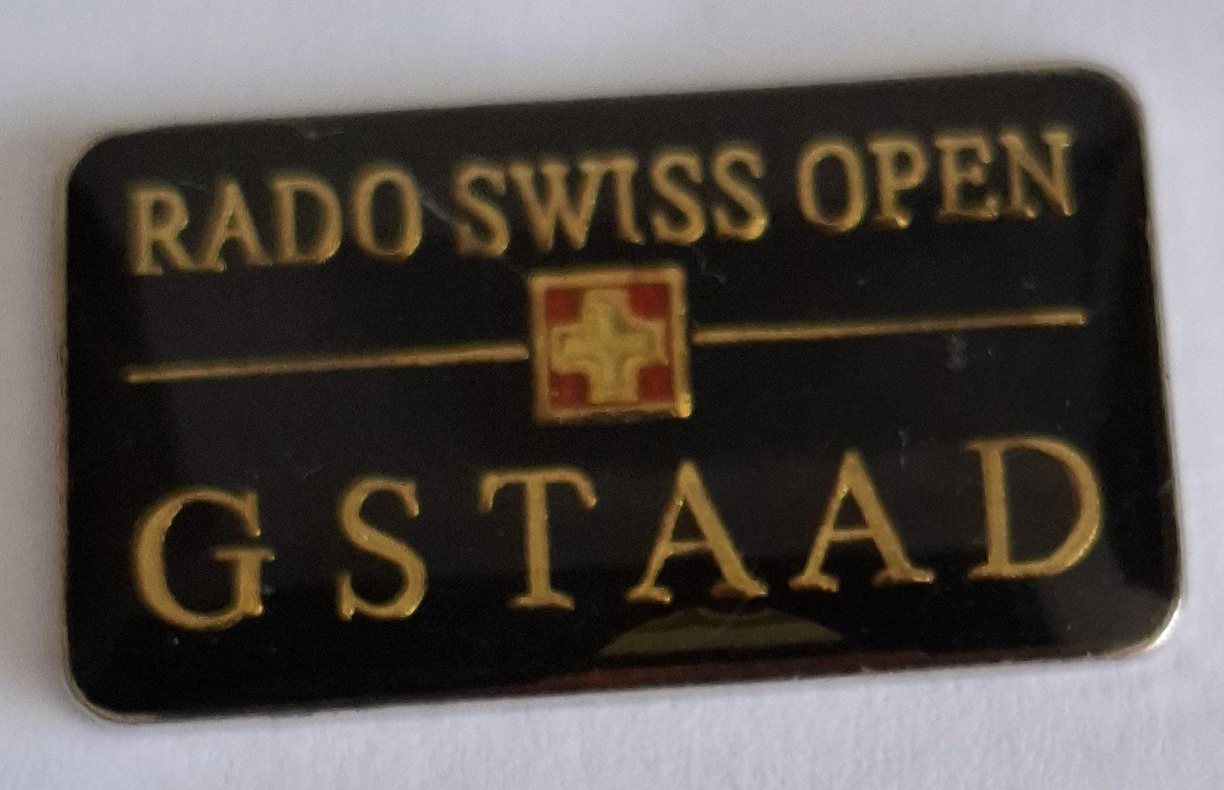 Placchette & Badge: Rado Swiss Open Gstaad – Usato da Hinterkappelen venduto da Schampus