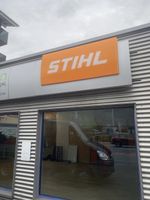 Stihl Firmenschild Leuchtreklame orange gebraucht