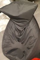 Schwarzer Sitzsack für gemütliche Stunden.
