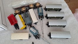 Märklin 18 Güterwagen/4 Personenwagen Ho WS/22