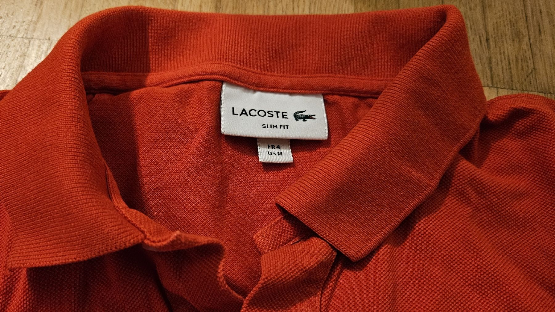 Lacoste Magliette Polo: Lacoste Shirt orange (gebraucht) – Usato da Grenchen venduto da Manuel.We 2
