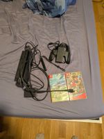 Nintendo Switch Konsole mit Zubehör und zwei Spielen