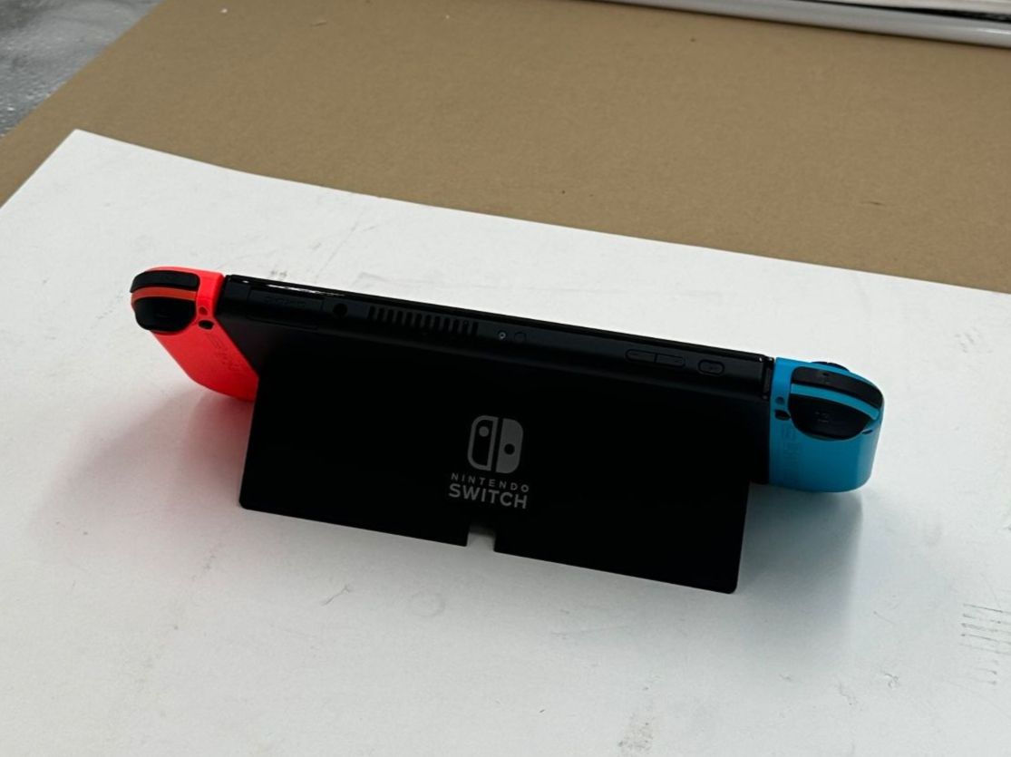 Nintendo Console: NINTENDO Switch OLED-Modell, Neon-Blau/Neon-Rot – Usato da Birmenstorf AG venduto da Distronics_SchweizAG 2