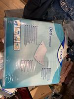 tena bettunterlage neu