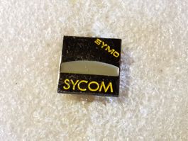 Ansteckpin 76: Sycom