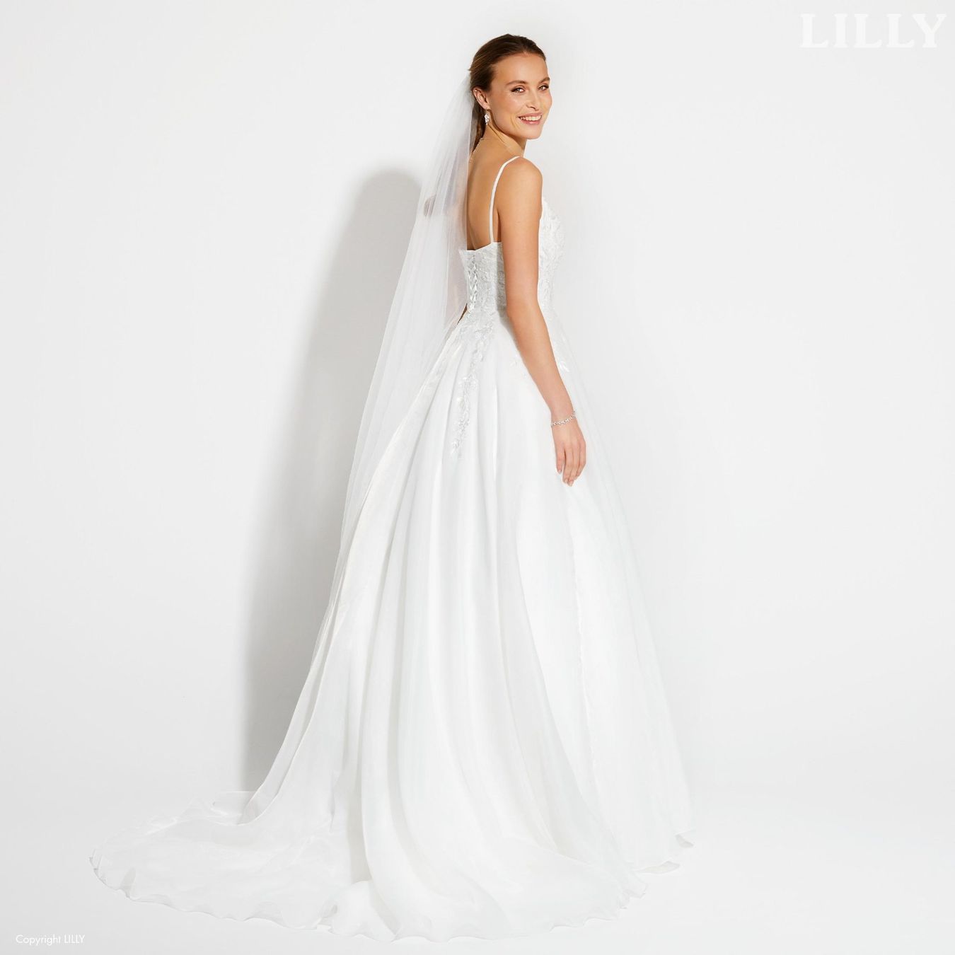 Vestiti: Secondhand Brautkleid von Lilly, Grösse 42 – Usato da Brunnen venduto da Herzig-Brautmode 1