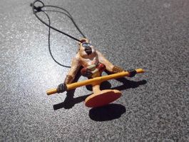 Chips-Figur Affe im Schneidersitz, braun