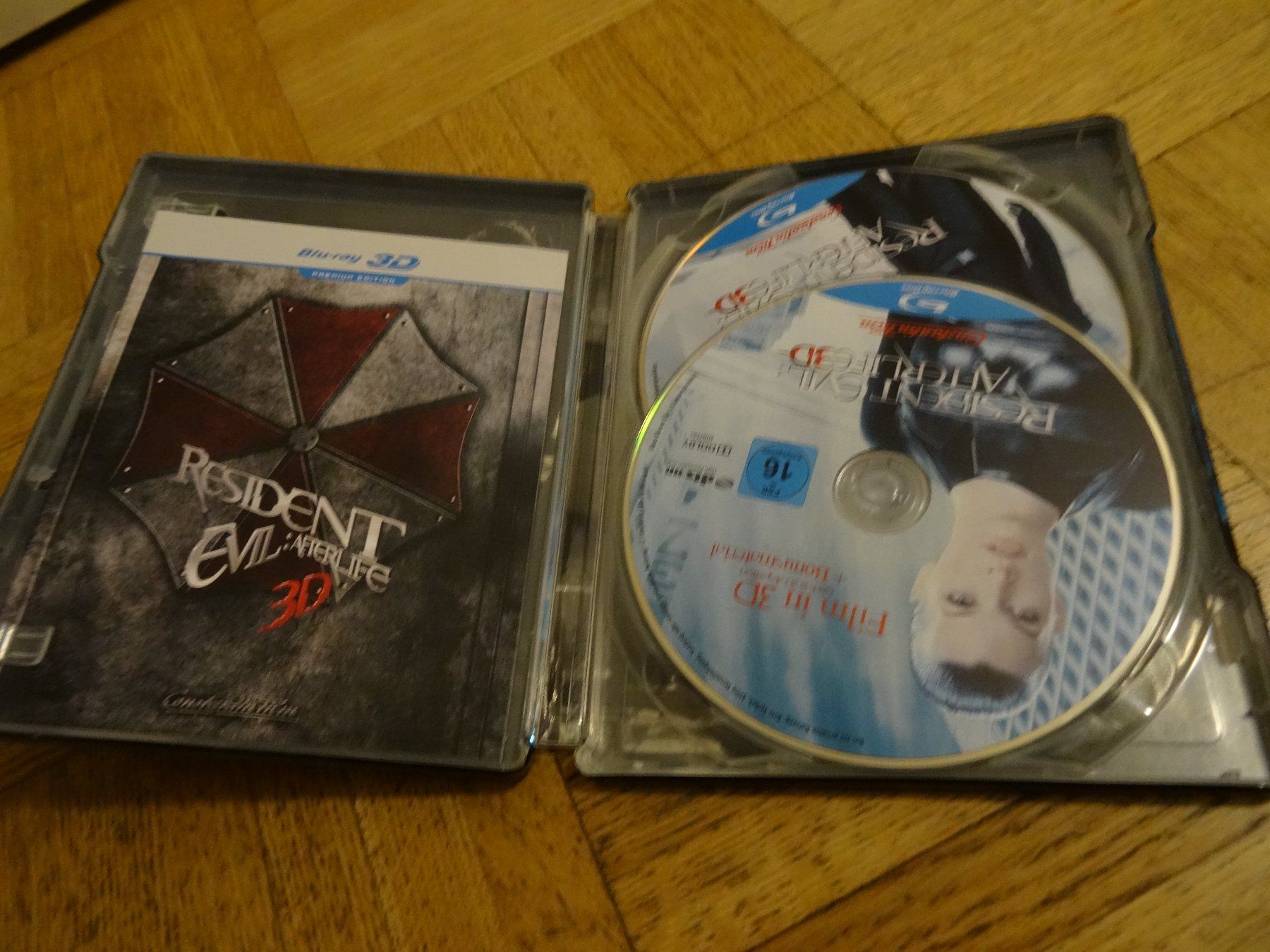 Tutti i DVDs: Resident Evil - Afterlife 3D STEELBOOK – Usato da Olten venduto da Disc-Verkauf 1