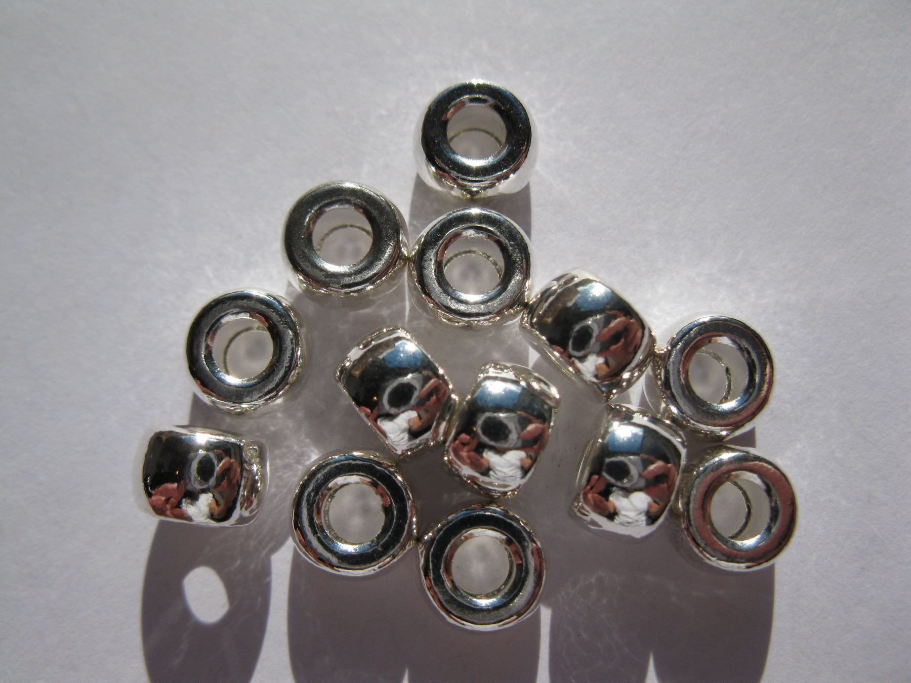Perle (finte): 12 Metallperlen versilbert 8x5mm – Nuovo e nell'imballaggio originale da St. Margarethen TG venduto da LuanaKa