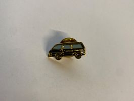 Pin's  voiture Nissan Vanette métal doré état occasion
