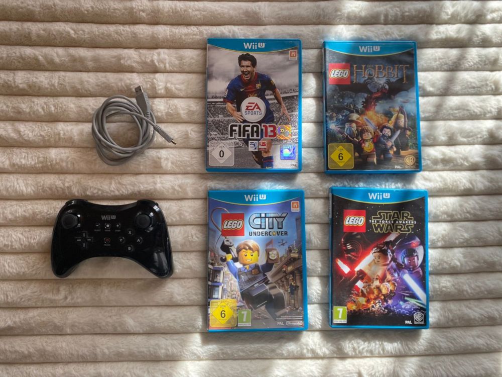 Wii U Set 4 Spiele + 1 Pro Controller mit Ladekabel Kaufen auf Ricardo
