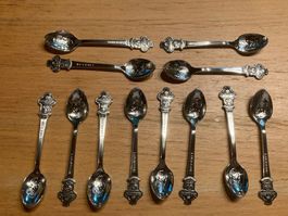 12 Sammlerlöffel Rolex Bucherer mit Löwenfigur