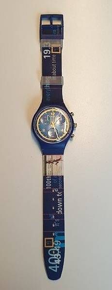 Swatch Orologi: Swatch Chrono GOLD MEDAL Michael Johnson – Nuovo e nell'imballaggio originale da Wil SG venduto da Drop4