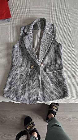 Gilet, S