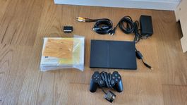 Playstation 2 Slim mit Anleitung Kabel und Controller