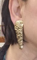 Boucles d'oreilles pendantes design dorées