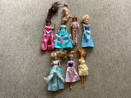 6 Barbie Puppen und 1 attraktiver Ken