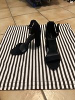 Sandales à talons noirs taille 38 bon état