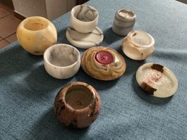 Lot  Kerzenhalter aus Stein diverse Formen
