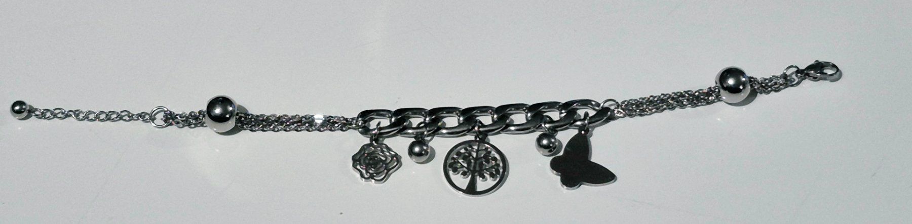 Bracciali & Braccialetti: Bracciale con ciondoli albero e farfalla – Usato da Giubiasco venduto da Stefaniav 8
