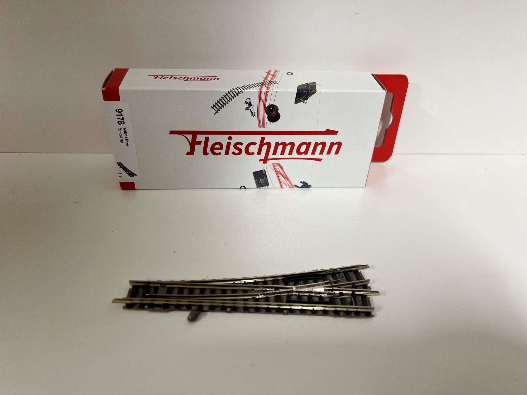 Fleischmann Modellini di ferrovie: Fleischmann Weiche links 9178 Neu – Nuovo e nell'imballaggio originale da Geroldswil venduto da TopTrain54