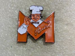 Ansteckpin 33: Migros Hausi