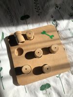 Jeu d'intelligence en bois pour chien et chat